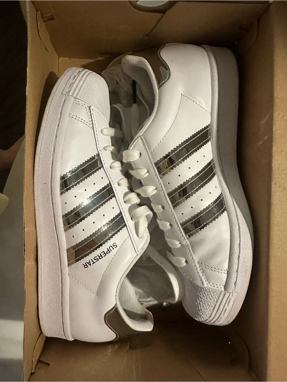 adidas Women’s Superstar Sneakers in White with Silver Stripes